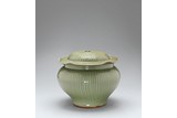 A RARE LONGQUAN CELADON RIBBED JAR AND COVER