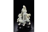 A LARGE CELADON JADE 'MYTHICAL BEAST' VASE AND COVER