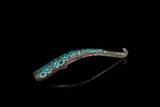 A GILT SILVER TURQUOISE INLAID BELT HOOK