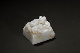 A WHITE JADE 'DRAGON' PAPER WEIGHT