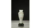 A WHITE JADE 'DRAGON' VASE WITH STAND