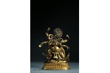 A GILT-BRONZE FIGURE OF MAHAKALA