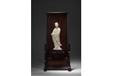 A CARVED 'GUANYIN' WHITE JADE TABLE SCREEN
