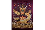 AN EMBROIDERED SILK DRAGON HANGING PANEL