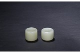 A PAIR OF WHITE JADE ARCHER'S RINGS
