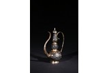 A SILVER 'DRAGON' EWER AND COVER