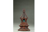 AN AGARWOOD STUPA WITH TURQUOISE JAMBHALA