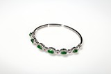 AN EMERALD JADEITE DIAMOND BRACELET