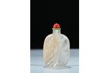 A MOTHER-OF-PEARL CARVED SNUFF BOTTLE