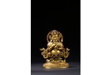 A GILT PAINTED FIGURE OF STANDING MAHAKALA