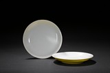 A PAIR OF YELLOW GLAZED INCISED DISHES