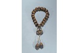 A GOLD-BEAD INLAID AGARWOOD ROSARY BRACELET