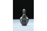 A SILVER CARVED 'FLOWER BASKET' SNUFF BOTTLE.
