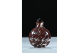 A TRANSPARENT GLASS BROWN SPECKLED SNUFF BOTTLE