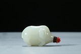 A WHITE JADE 'PIG' SNUFF BOTTLE
