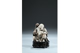 A FURONG SOAPSTONE CARVED FIGURE OF LIUHAI