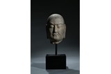 A LIMESTONE CARVED HEAD OF LUOHAN