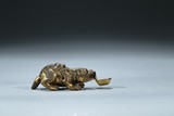 A GILT BRONZE MYTHICAL BEAST DROPPER