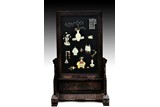 A VERY LARGE JADE INSET AND GILT-PAINTED HARDWOOD SCREEN