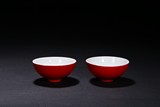 A PAIR OF RED GLAZED BOWLS