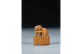 A SHOUSHAN CARVED 'LION' OVAL SEAL