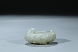A WHITE JADE 'CHILONG' WATER COUPE