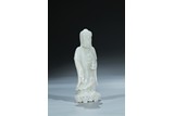 A WHITE JADE CARVED STANDING BODHISATTVA