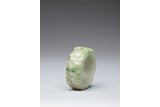 A JADEITE CARVED BANGLE