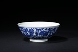 A BLUE AND WHITE GLAZED 'PHOENIX' BOWL