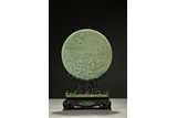 A CELADON JADE CIRCULAR TABLE SCREEN
