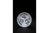 A BLUE AND WHITE RED UNDERGLAZED 'PEACH' DISH