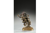 A GILT BRONZE FIGURE OF DAKINI
