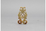 A JADE CARVED 'DOUBLE PHOENIX' PENDANT