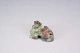 A JADE CARVED MYTHICAL BEAST