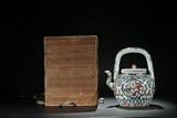 A WUCAI 'DRAGON AND PHOENIX' TEAPOT AND COVER