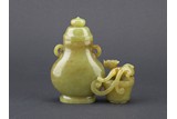 A YELLOW JADE CARVED 'CHILONG' JOINED VESSEL
