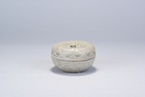 A CARVED 'YUE' WARE CELADON BOX AND COVER