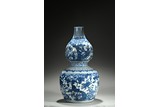 A LARGE BLUE AND WHITE DOUBLE GOURD VASE