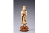 A SOAPSTONE CARVING OF STANDING GUANYIN WITH INSCRIPTION