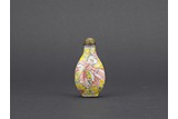 A BEIJING ENAMEL YELLOW GROUND 'SASH TIED' SNUFF BOTTLE