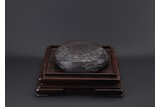 A VERY LARGE INKSTONE WITH HARDWOOD STAND