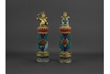 A PAIR OF BRONZE ENAMELLED 'FIGURES' RITUAL OBJECTS