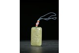 A CHINESE YELLOW JADE RECTANGULAR PLAQUE
