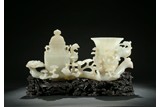 A WHITE JADE 'PHOENIX AND LINGZHI' VASE GROUP
