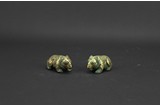 A PAIR OF GOLD INLAID BRONZE BEARS