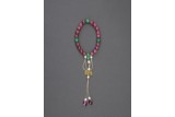 A PINK TOURMALINE AND JADEITE BEAD ROSARY BRACELET