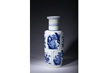 A BLUE AND WHITE ROULEAU VASE