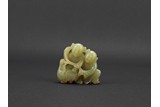 A YELLOW JADE CARVING OF BOYS AND GOOSE