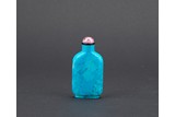 A TURQUOISE CARVED SNUFF BOTTLE