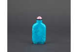 A TURQUOISE CARVED SNUFF BOTTLE